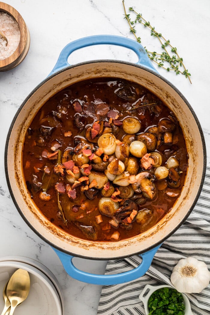 Beef burgundy with mushrooms in a pot