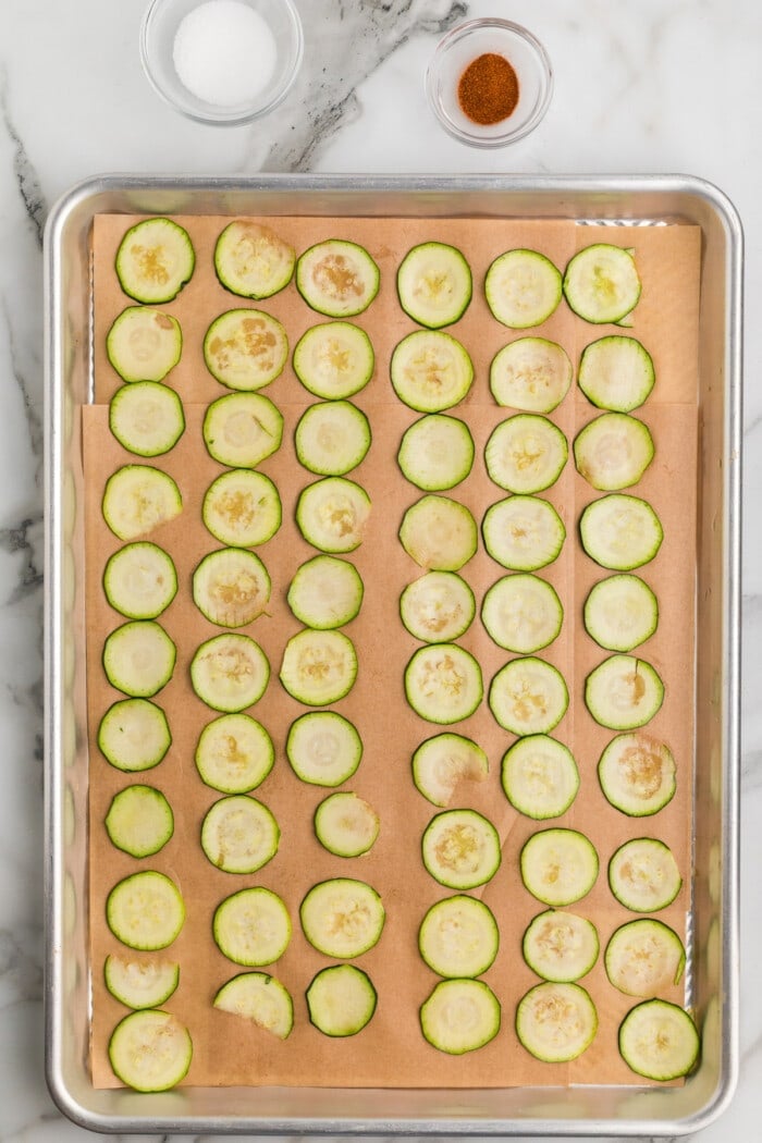 zucchini chips on baking sheet