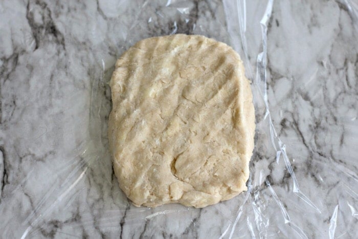 dough in plastic wrap