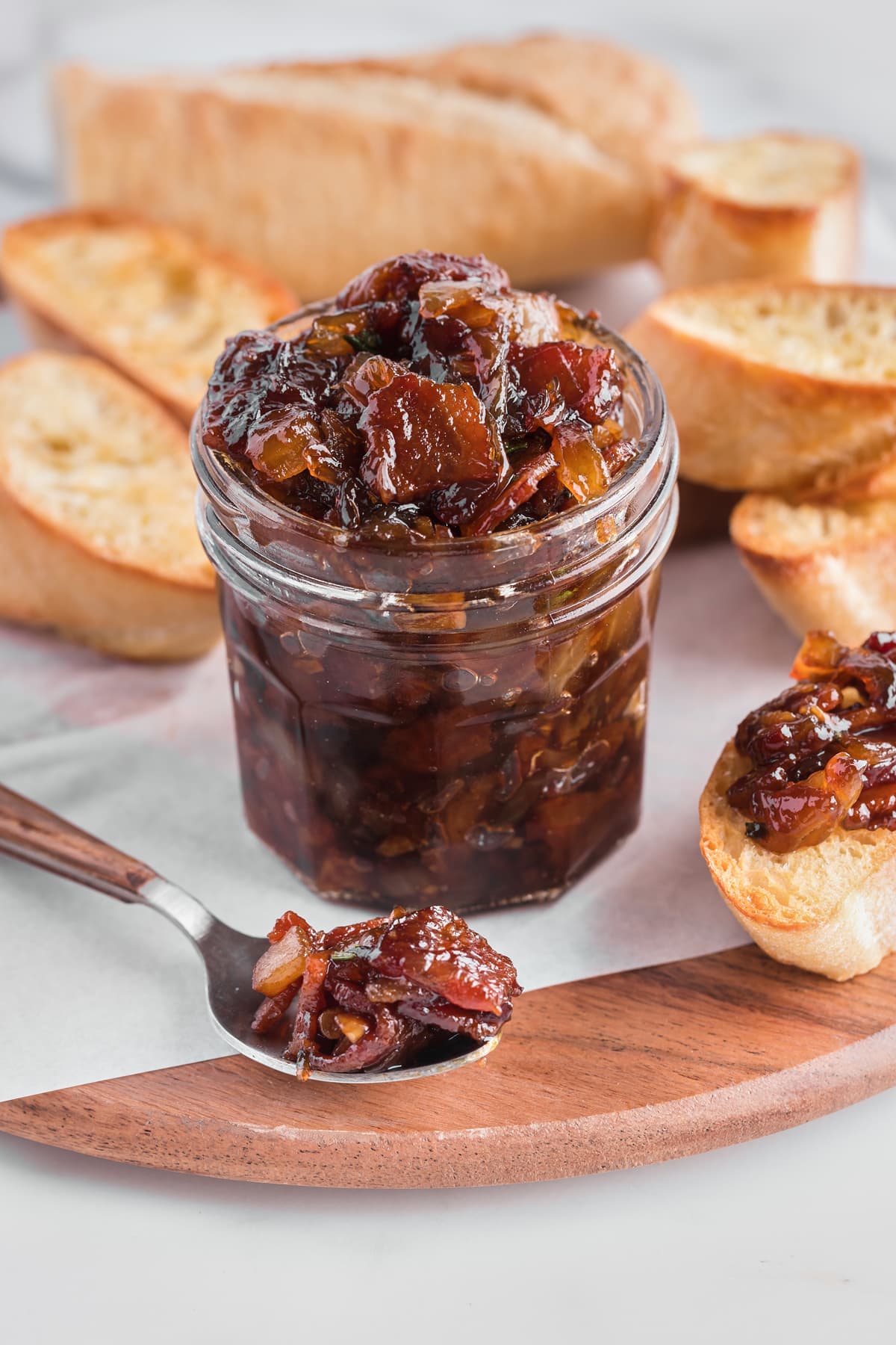 jar with bacon jam and bread