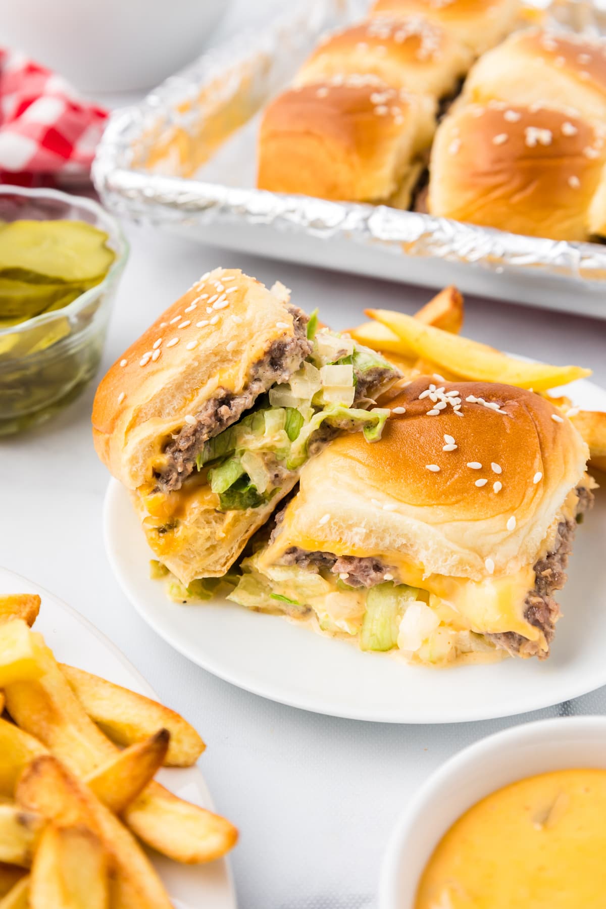 big mac sliders on plate with french fries
