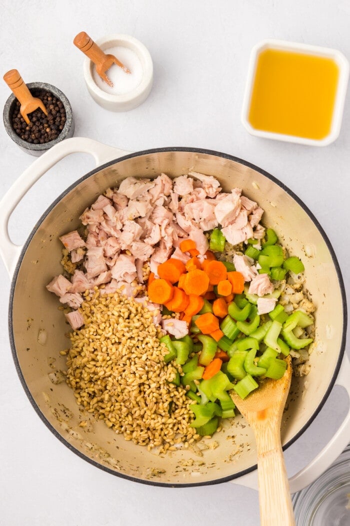 chicken, barley and vegetables in dutch oven