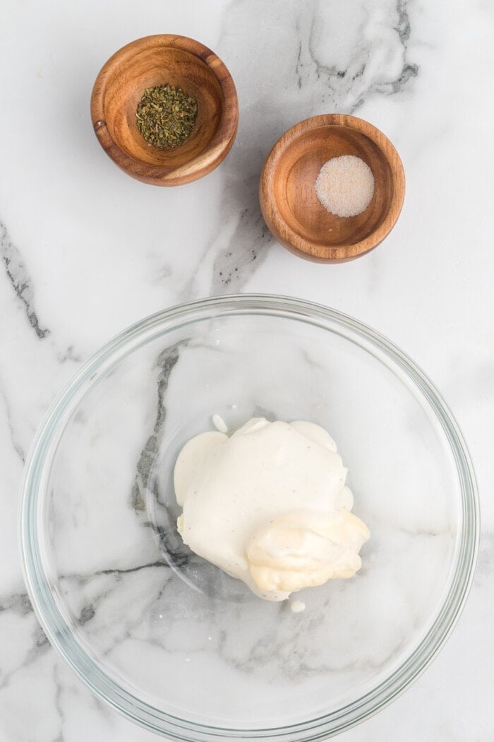 mayonnaise and ranch dressing in glass bowl