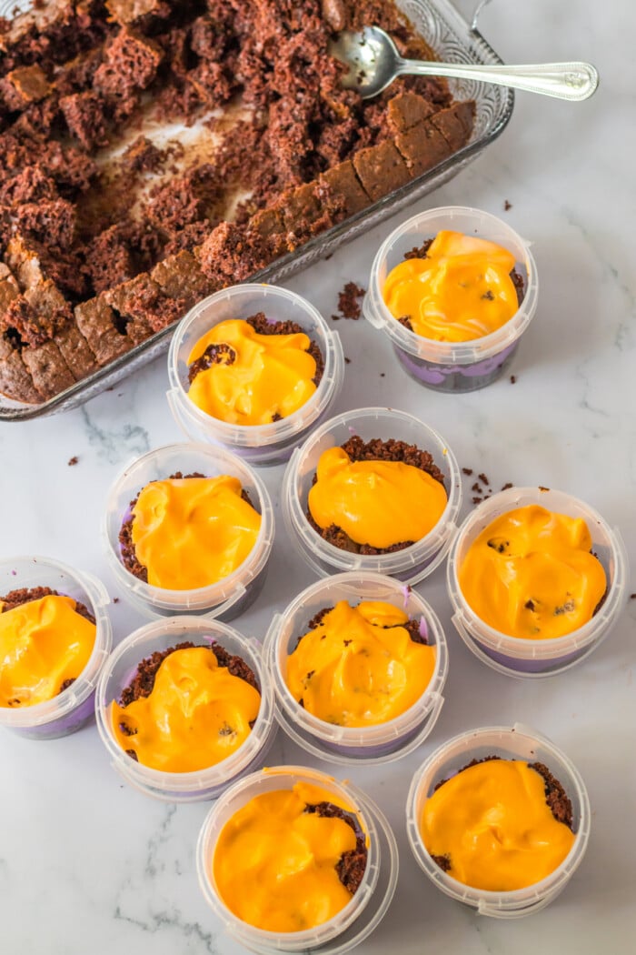 orange pudding in cups for graveyard pudding