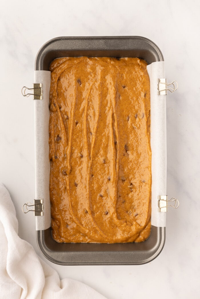 pumpkin chocolate chip bread in loaf pan for oven