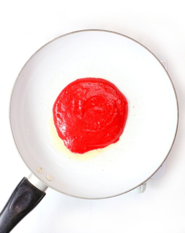 red velvet pancake in skillet