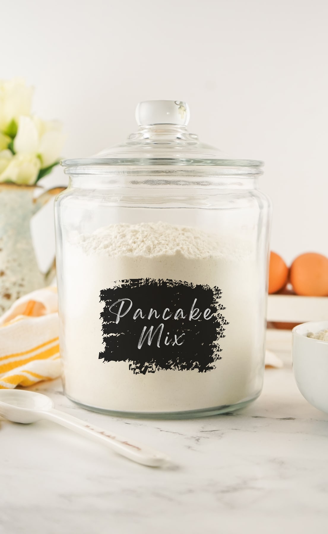 A jar of pancake mix with a chalkboard label