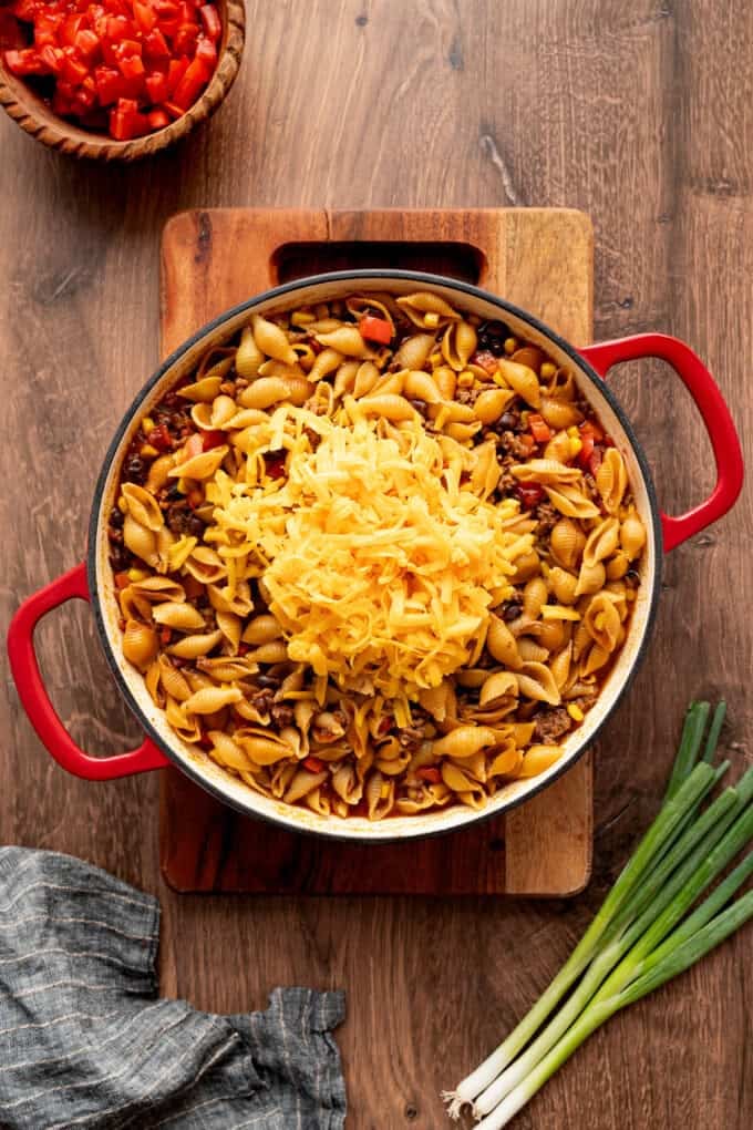 Shredded cheese added to the taco pasta