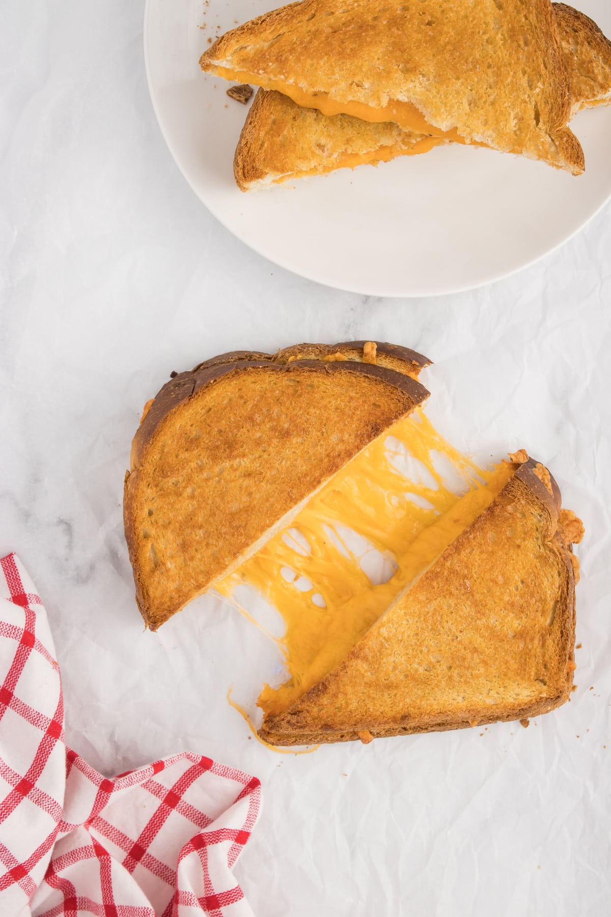 air fryer grilled cheese cut with cheese pulled