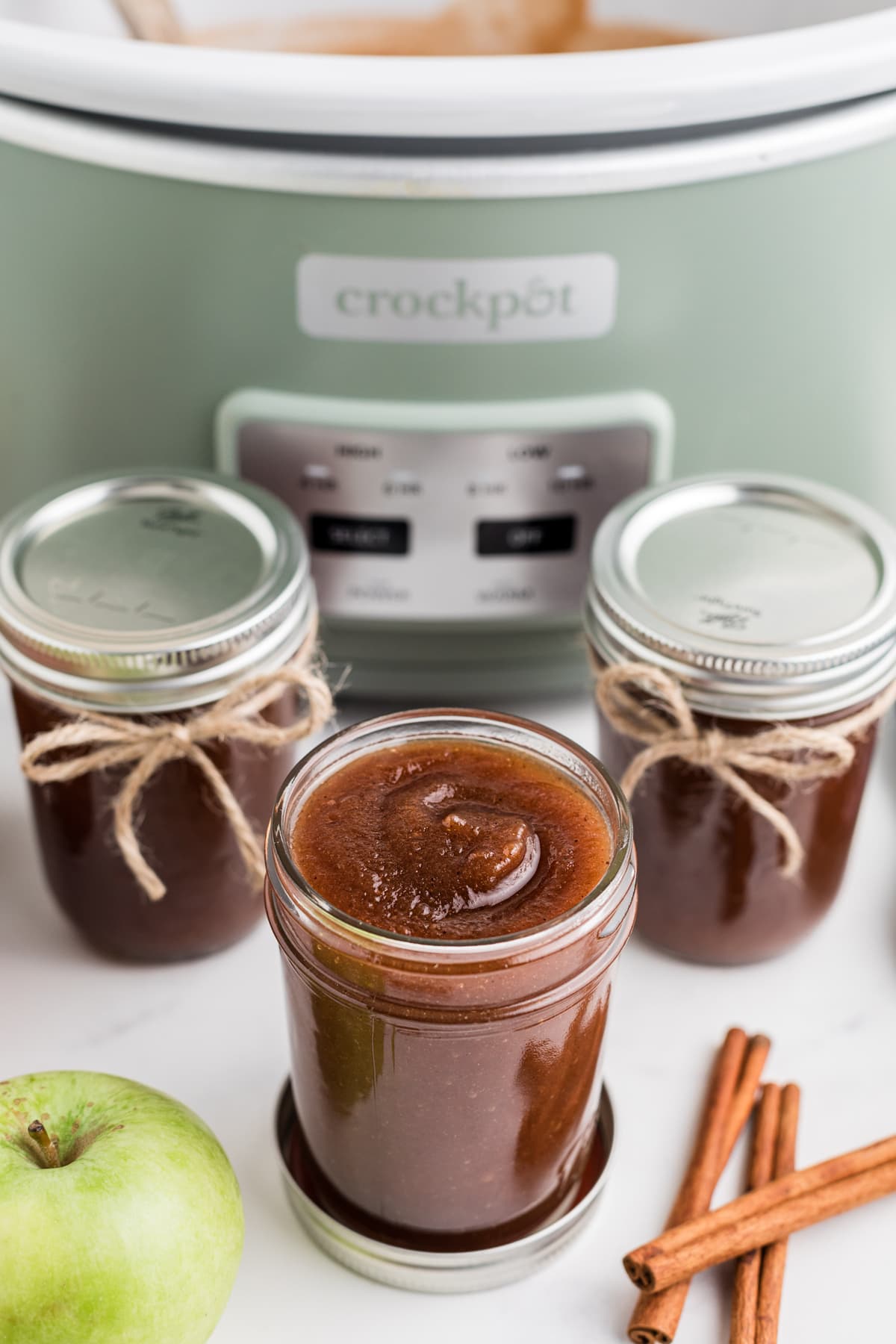 mason jars with crockpot apple butter