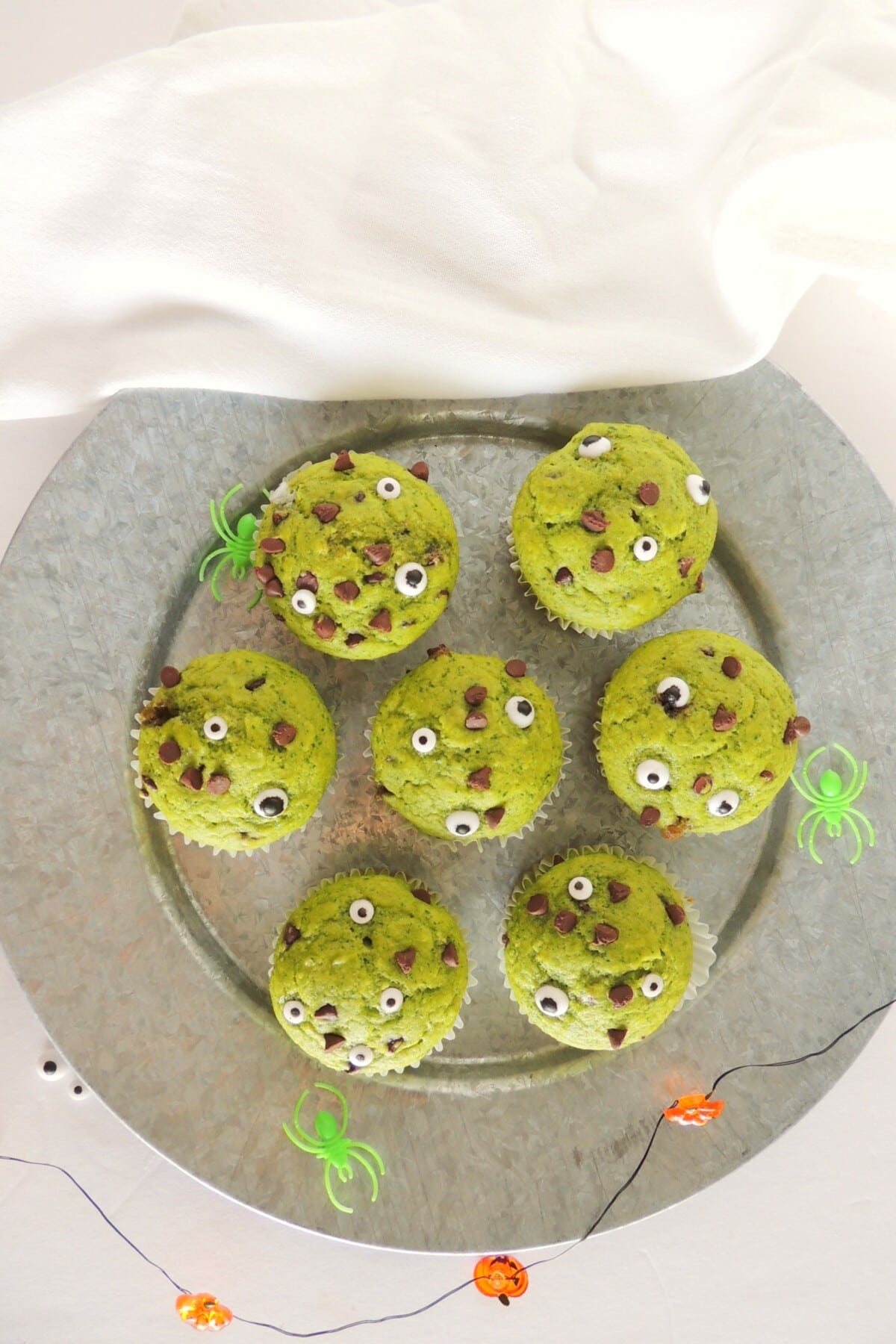monster muffins on a gray plate with a white napkin