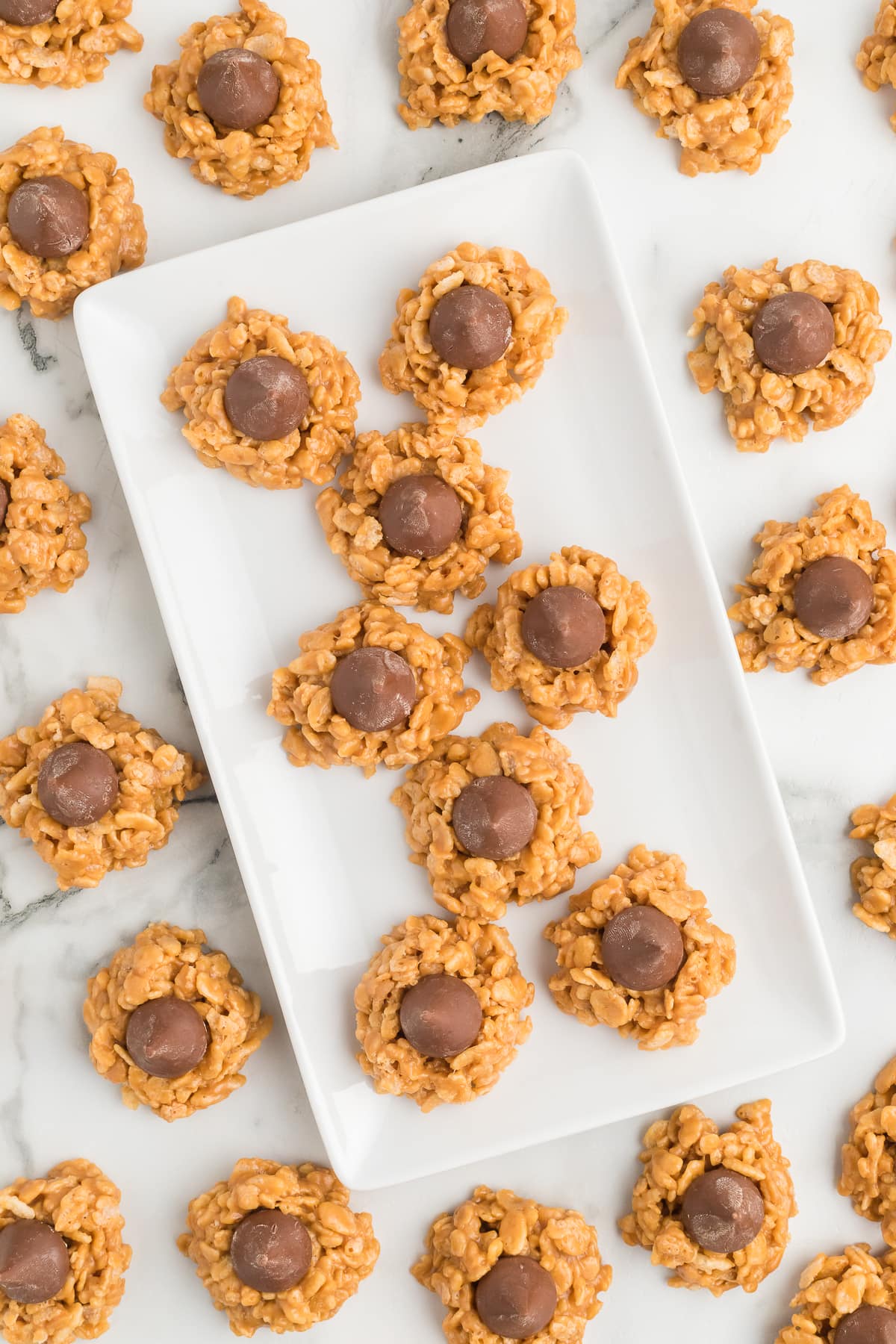 no bake peanut butter  kiss cookies on a white plate