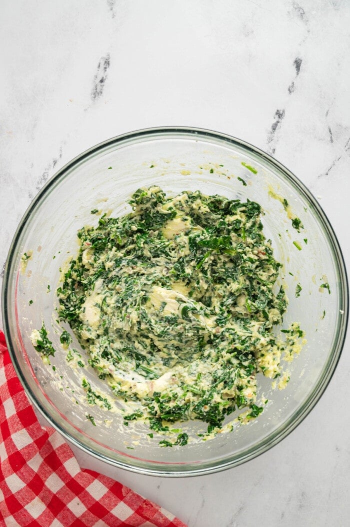 Spinach and cream cheese mixture in a glass bowl