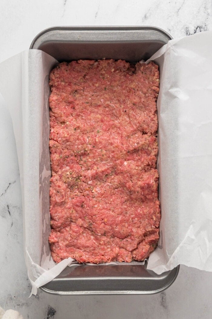 meatloaf in pan with parchment paper
