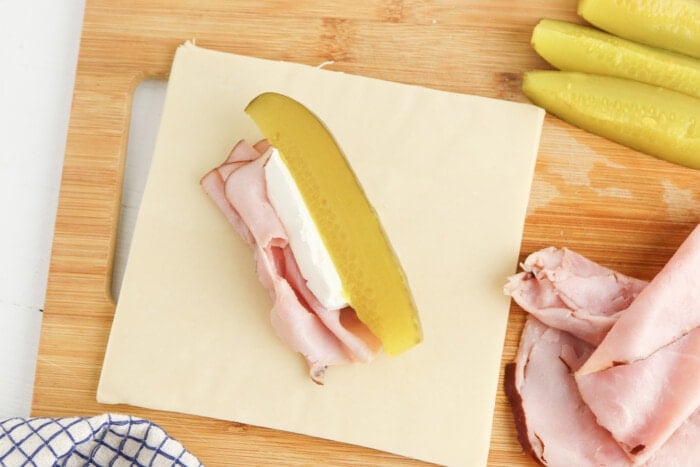 ham, pickle and cream cheese on the wrapper