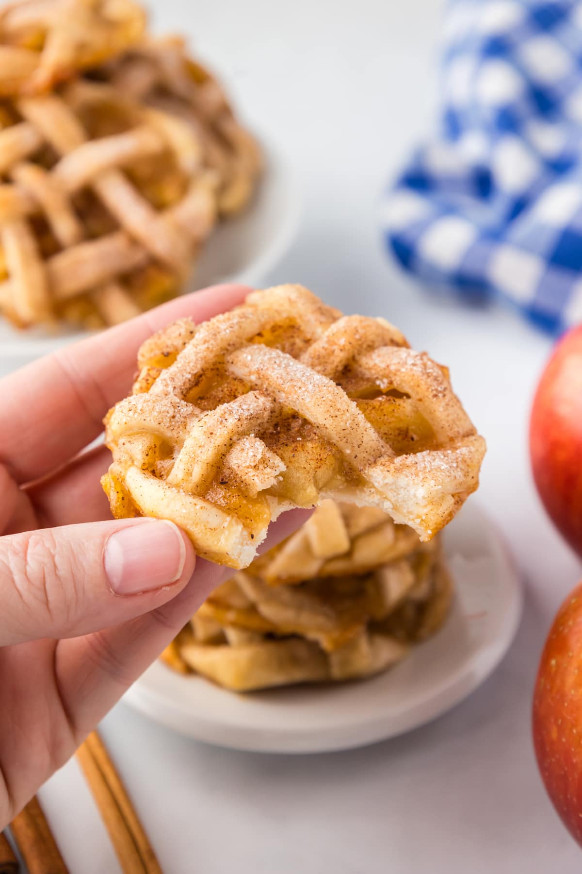 hand holding apple pie cookies