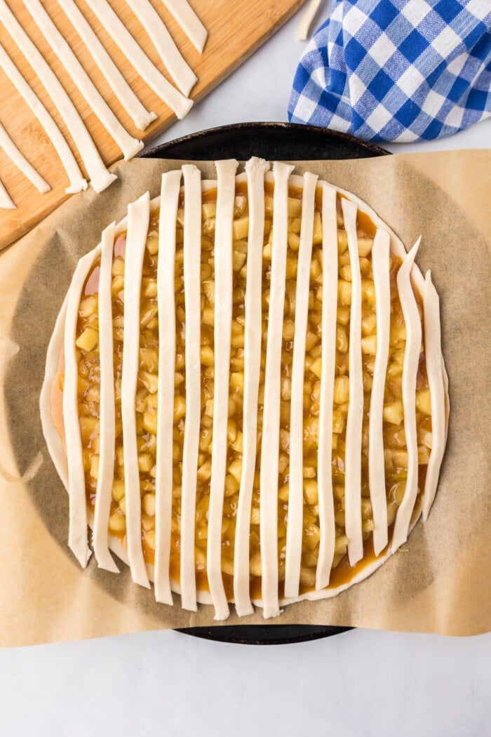strips of pie crust on top of apple pie filling for cookies