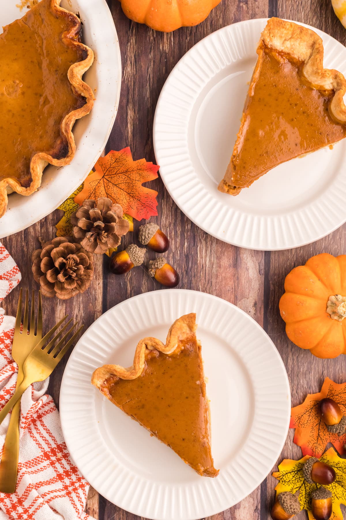 A table setting with pumpkin pie.