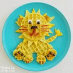 Lion waffle breakfast on a blue plate