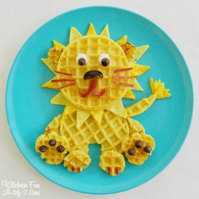 Lion waffle breakfast on a blue plate