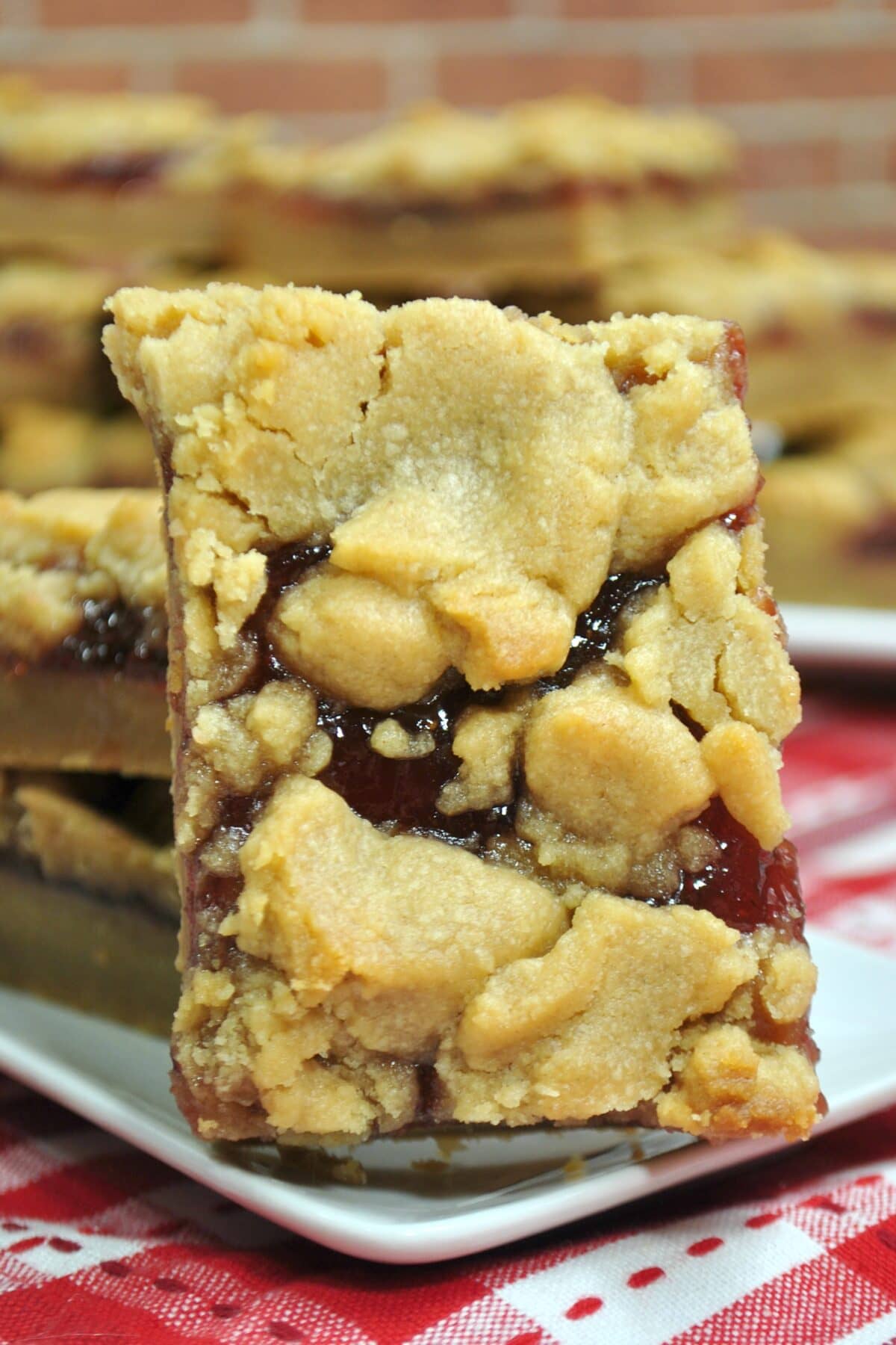 Peanut butter and jelly bars on a plate