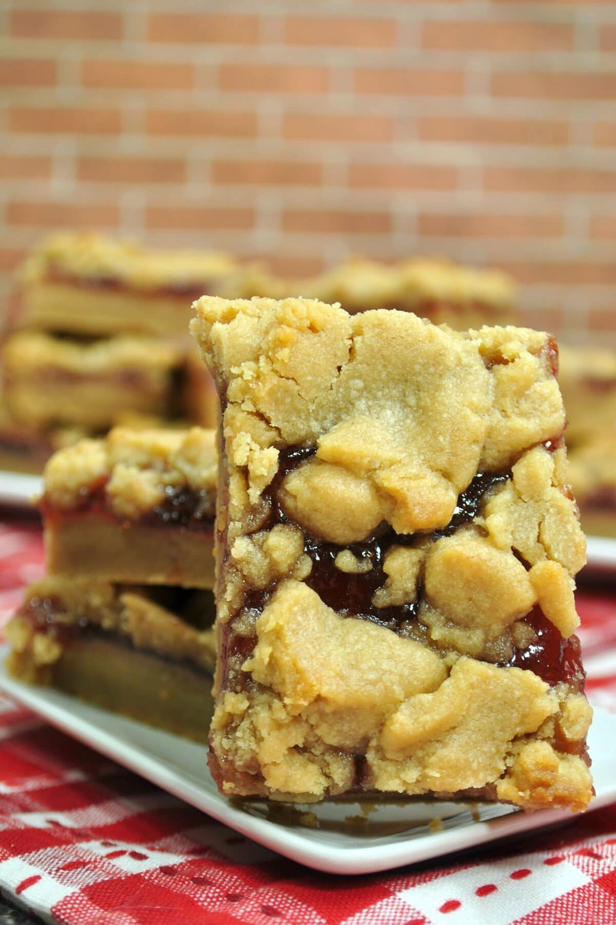 Peanut butter and jelly bars on a plate