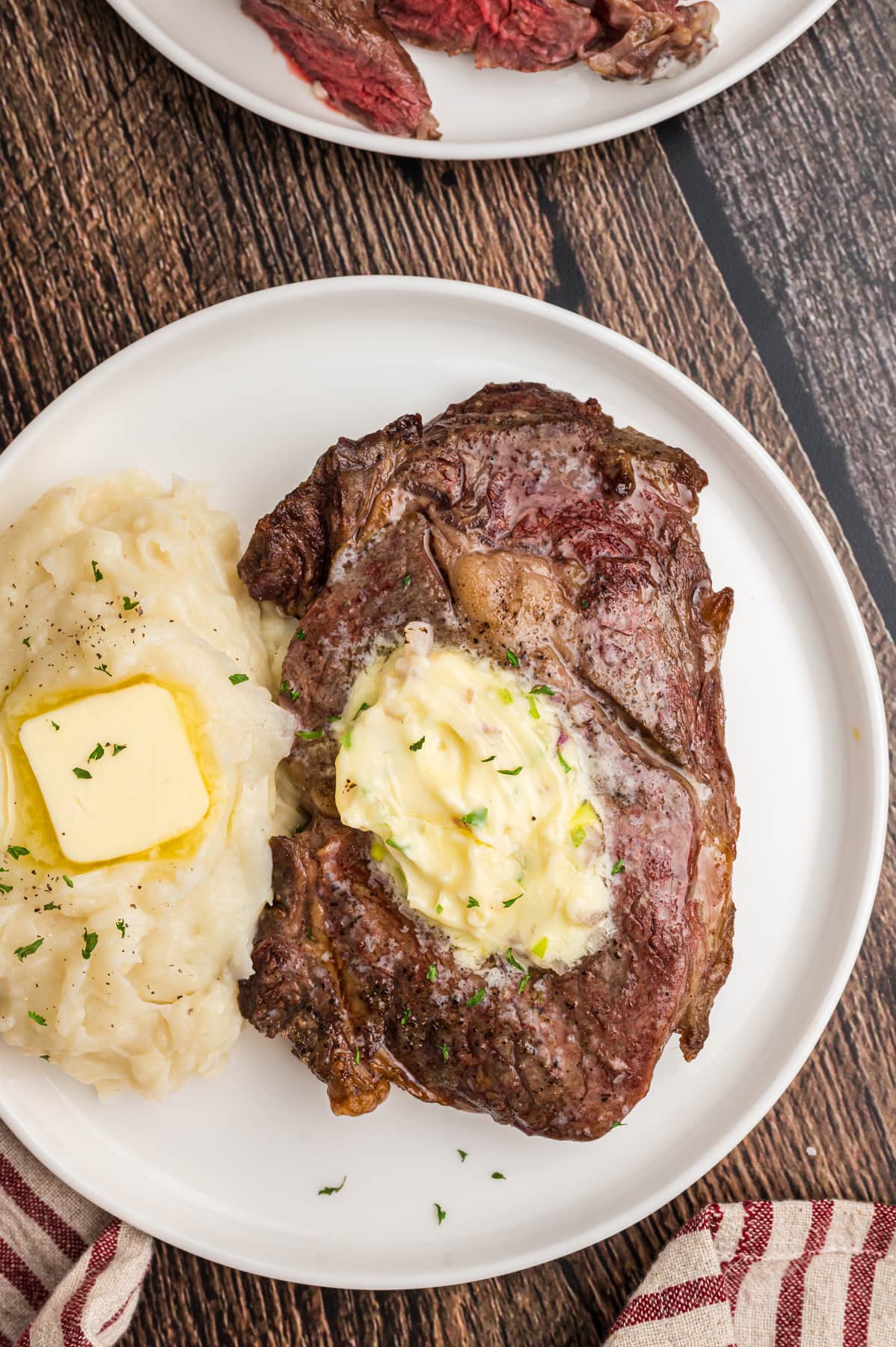 Air fryer steak on a plate with mashed potatoes