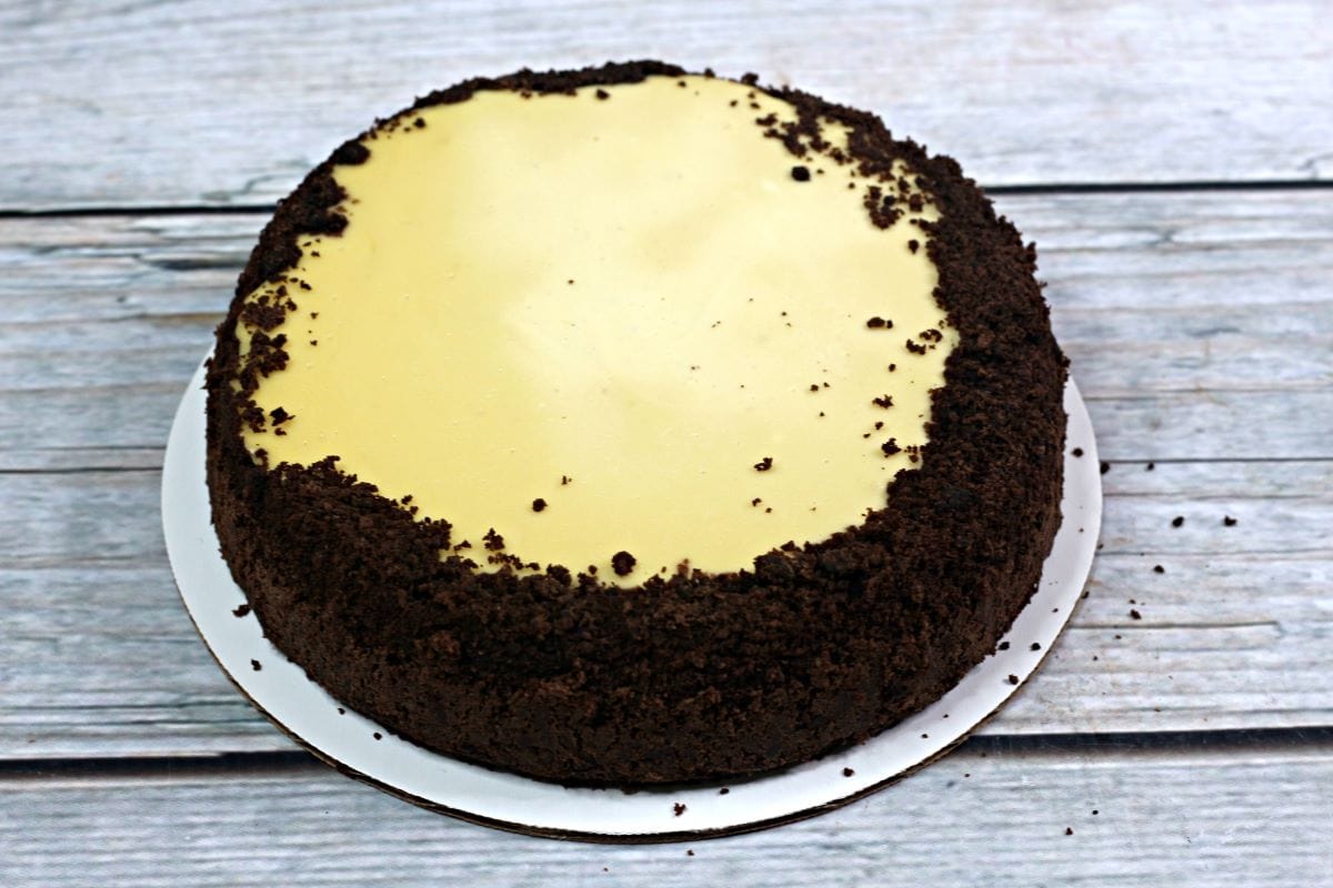 A Baileys Cheesecake on cake board