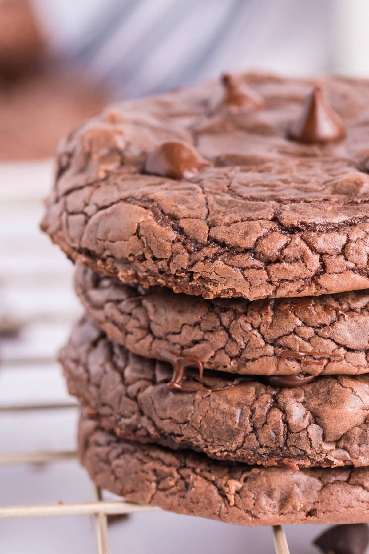 Brownie Mix Cookie stacked on a cooling rack.