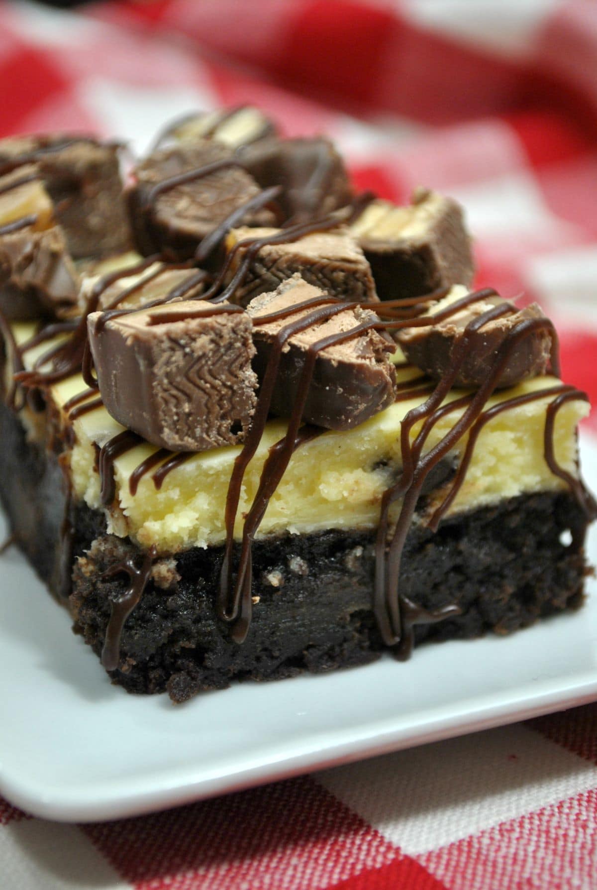 Snickers Cheesecake Brownie on plate
