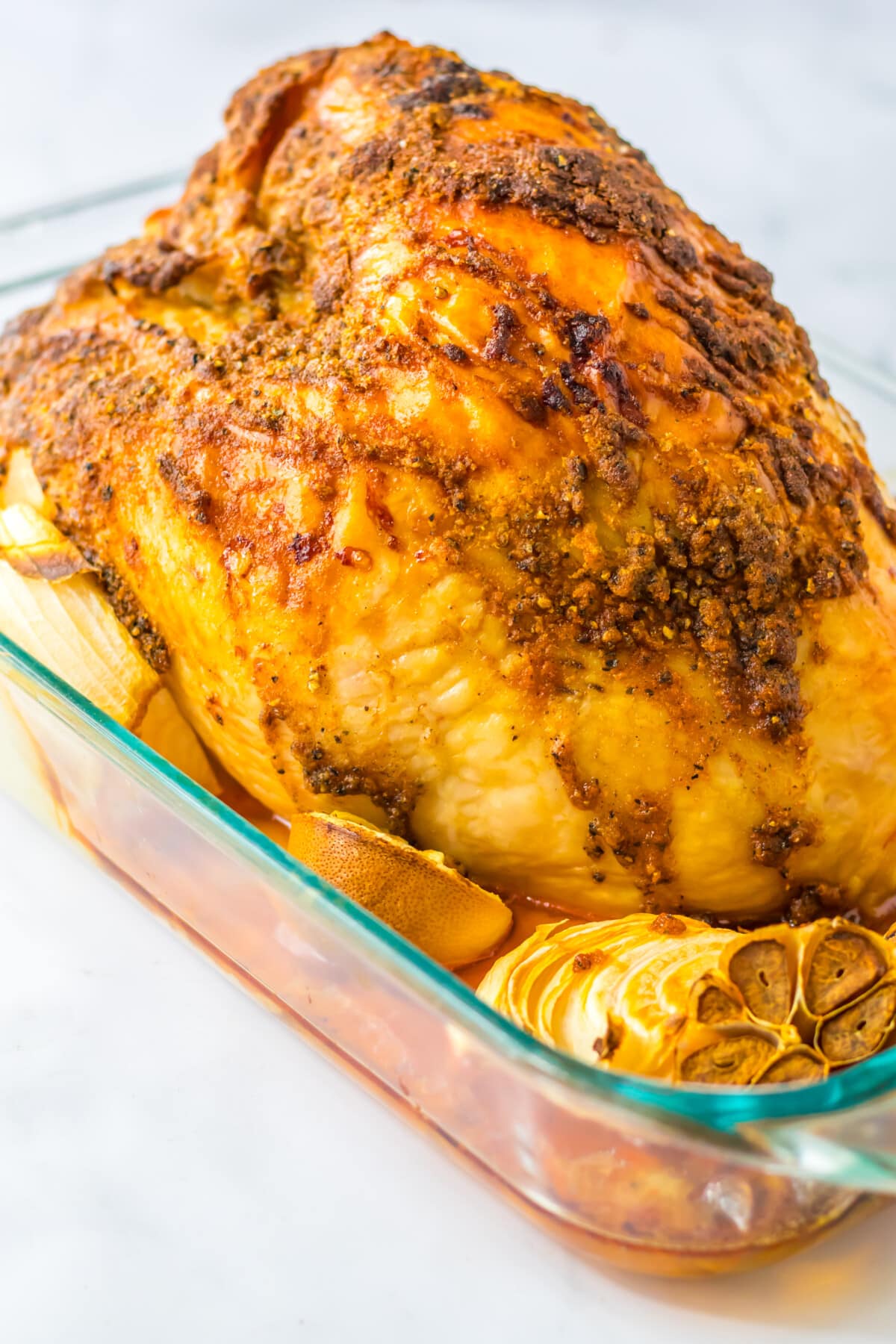 roasted turkey breast in a glass baking dish