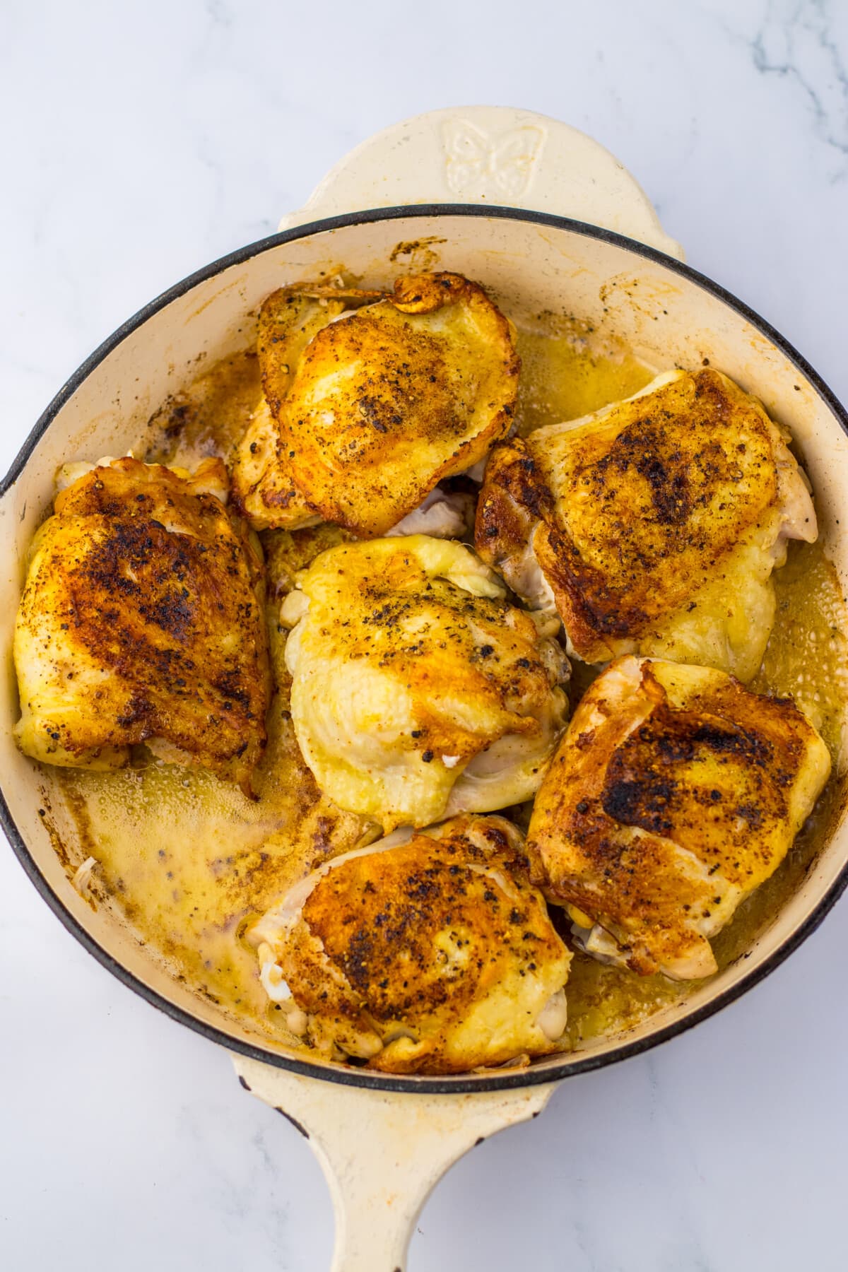 seared chicken in a pan