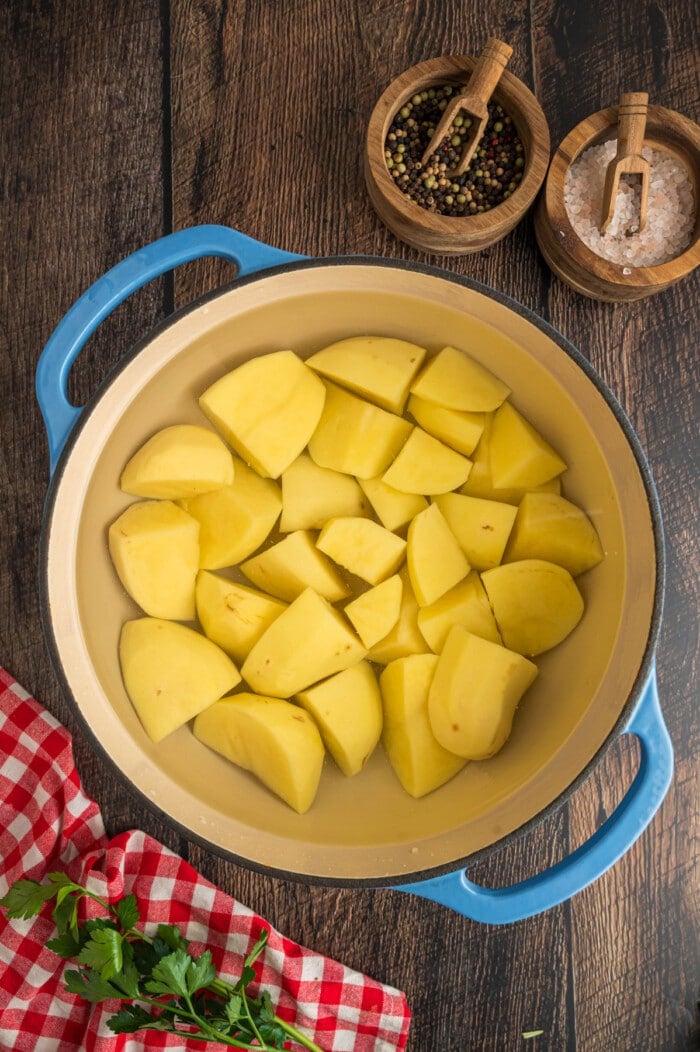 Cubed yellow potatoes in a big pot