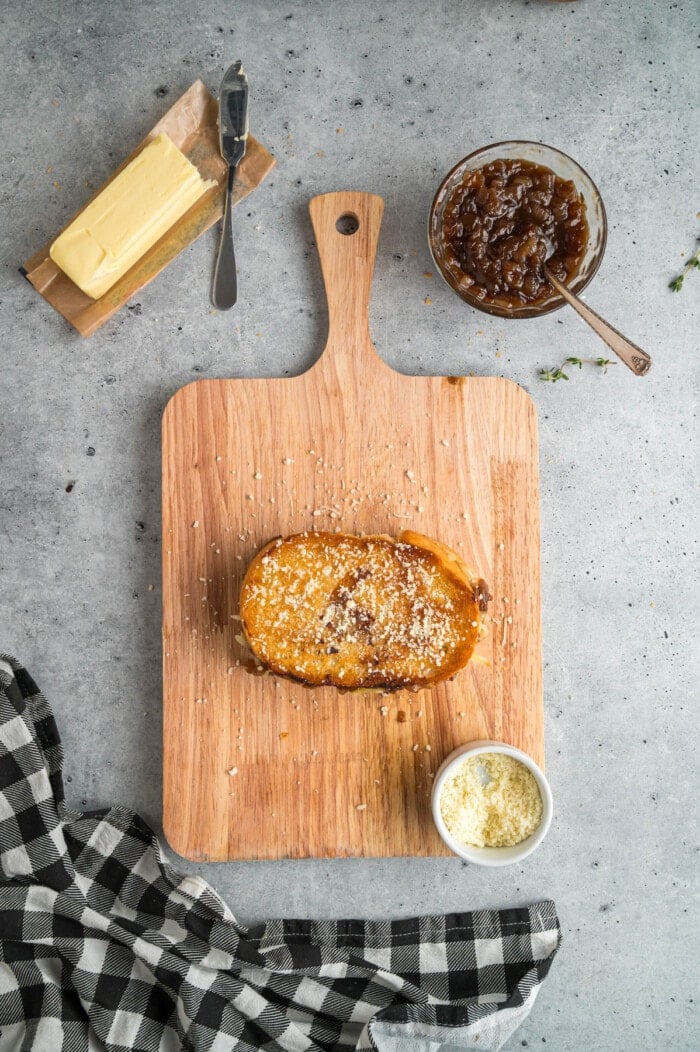 French Onion Grilled Cheese on a cutting board.