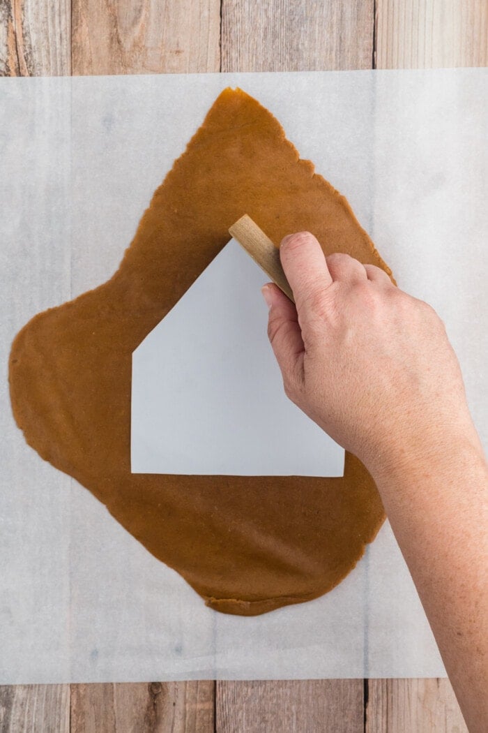 Using a template to cut out the gingerbread pieces 