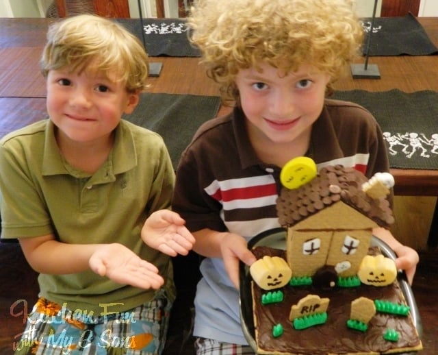two boys with their graham cracker haunted house