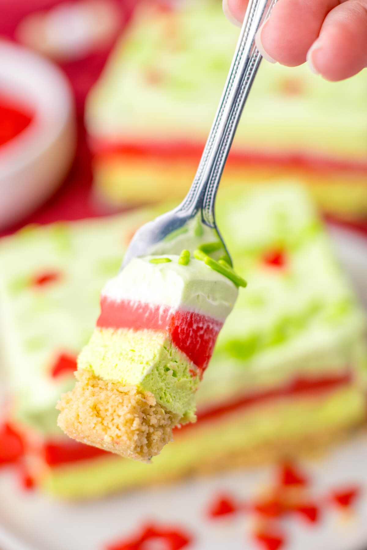 grinch cheesecake lush on a fork