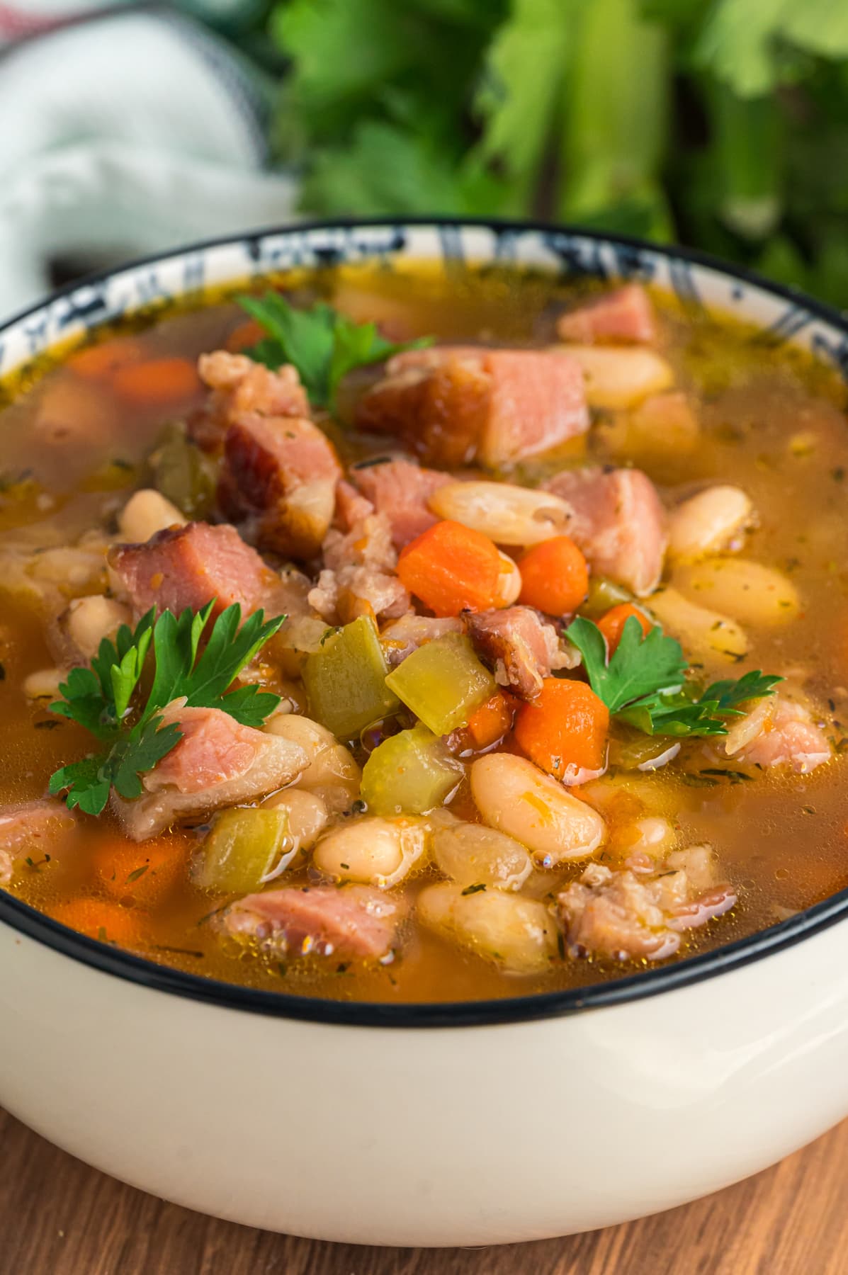 Ham and Bean Soup in a white bowl.
