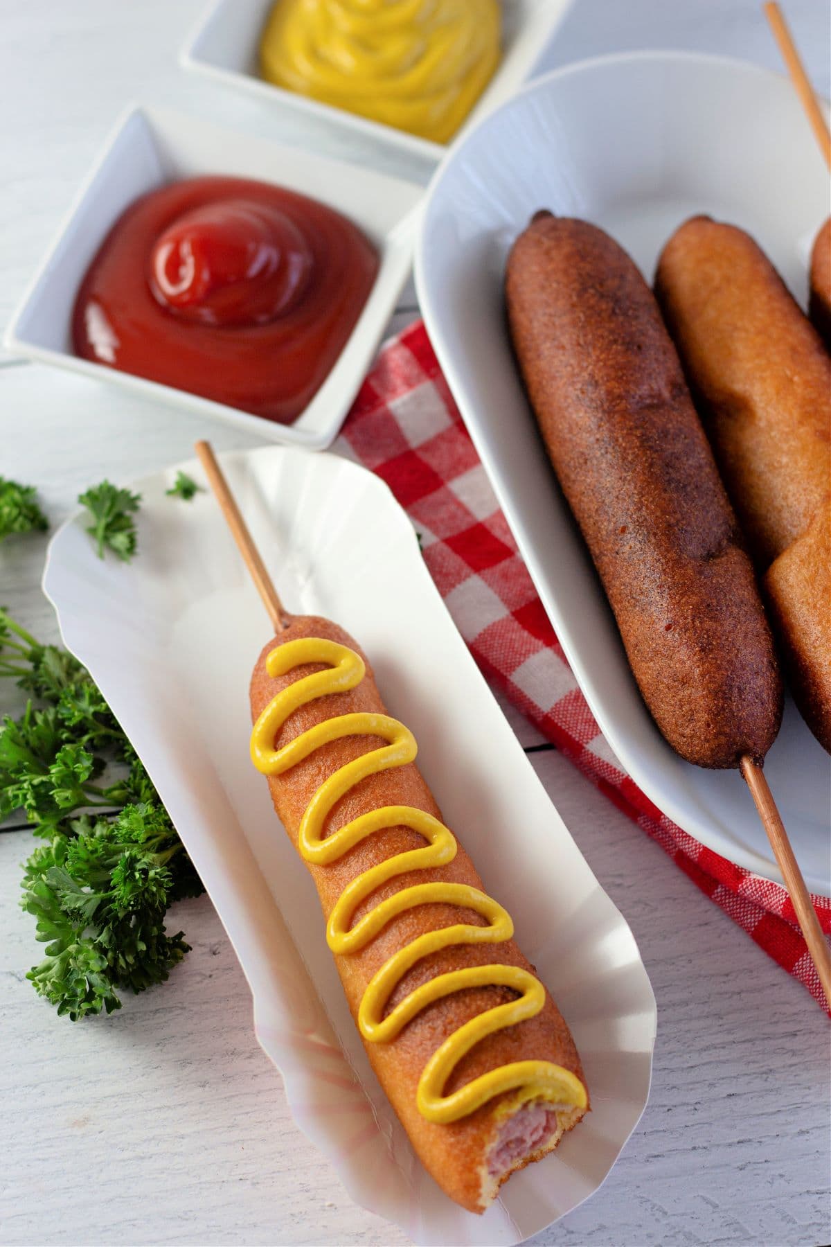 Homemade Corn Dog with mustard on top