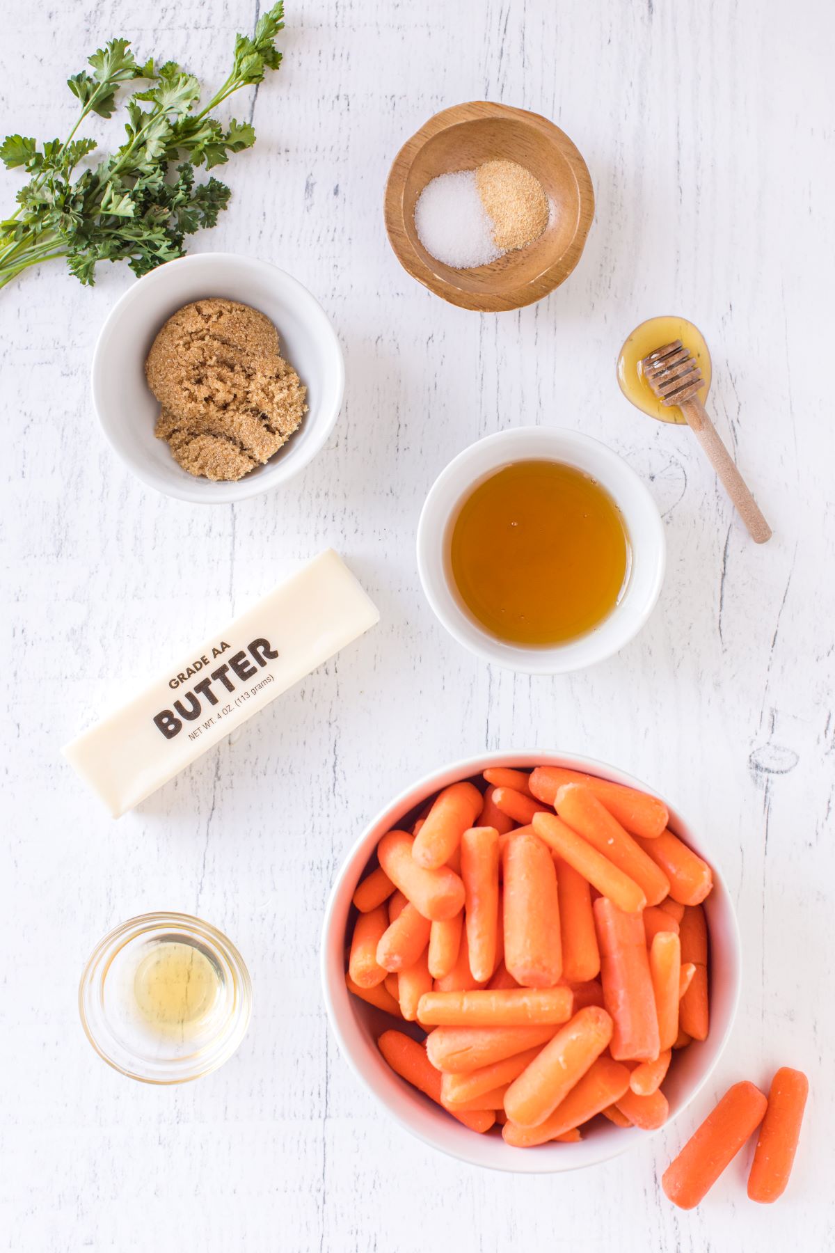 Ingredients to make honey glazed carrots