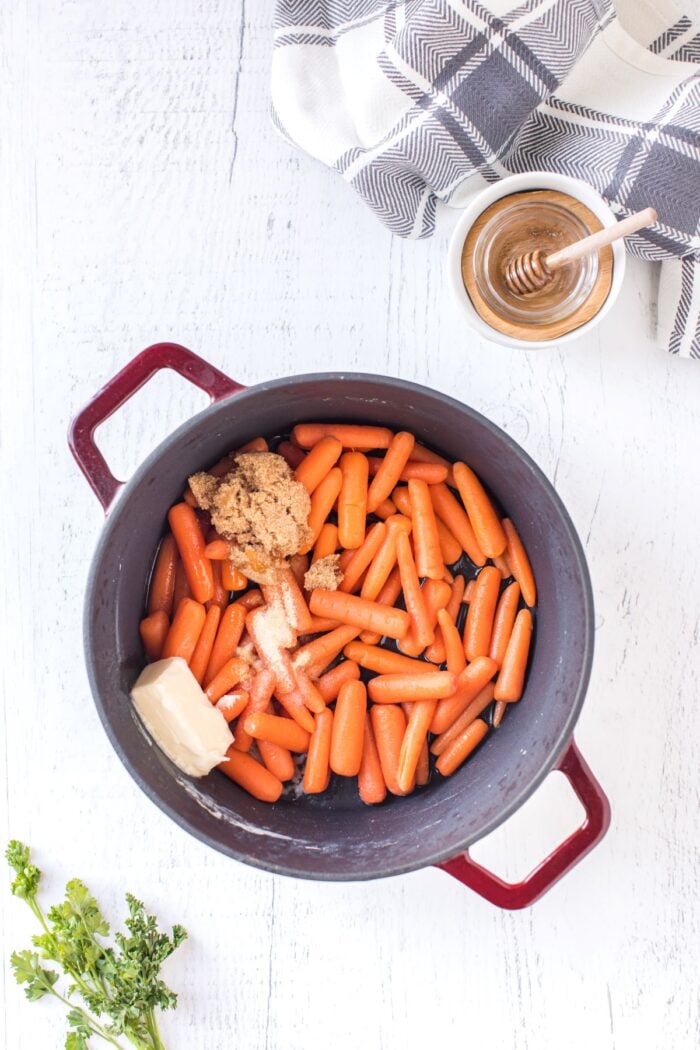 carrots and ingredients in a pot