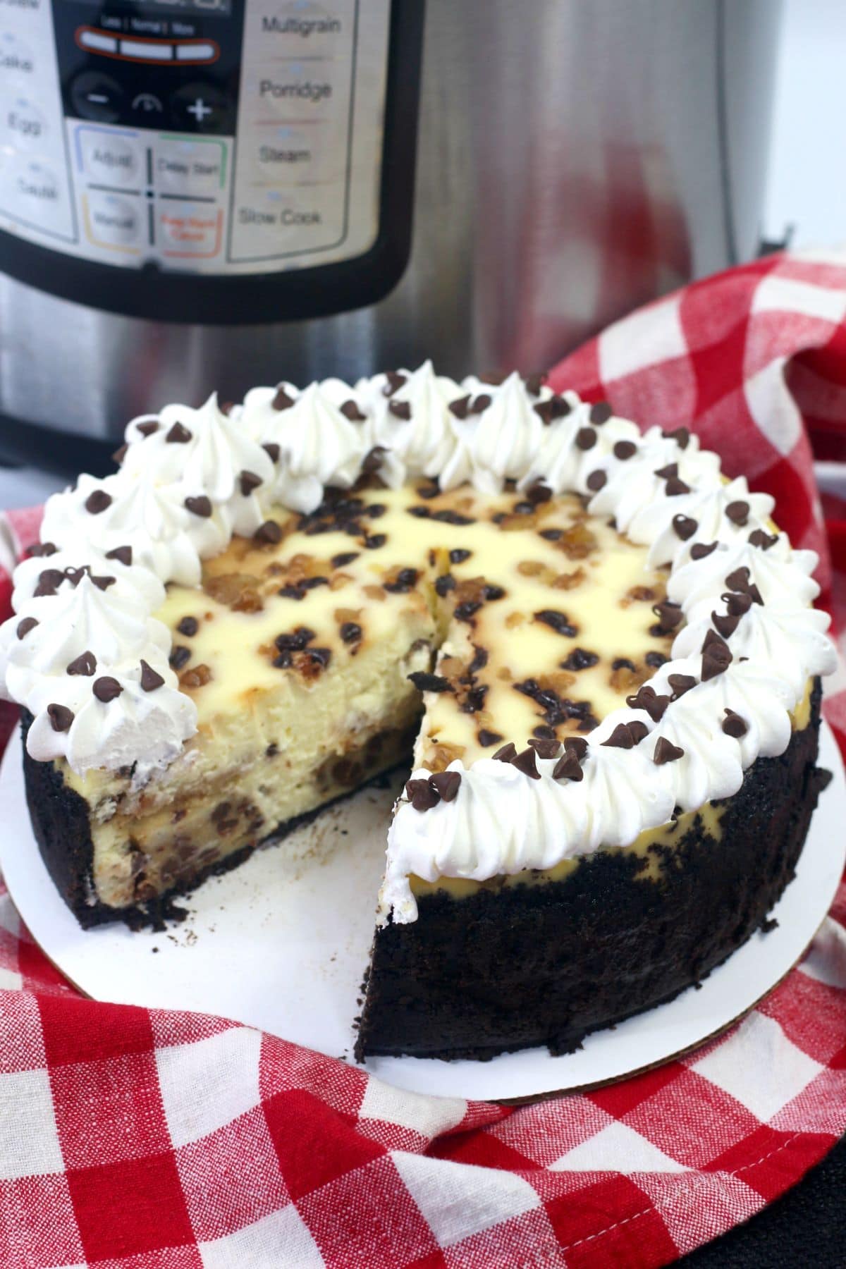 Instant Pot Cookie Dough Cheesecake with a slice missing