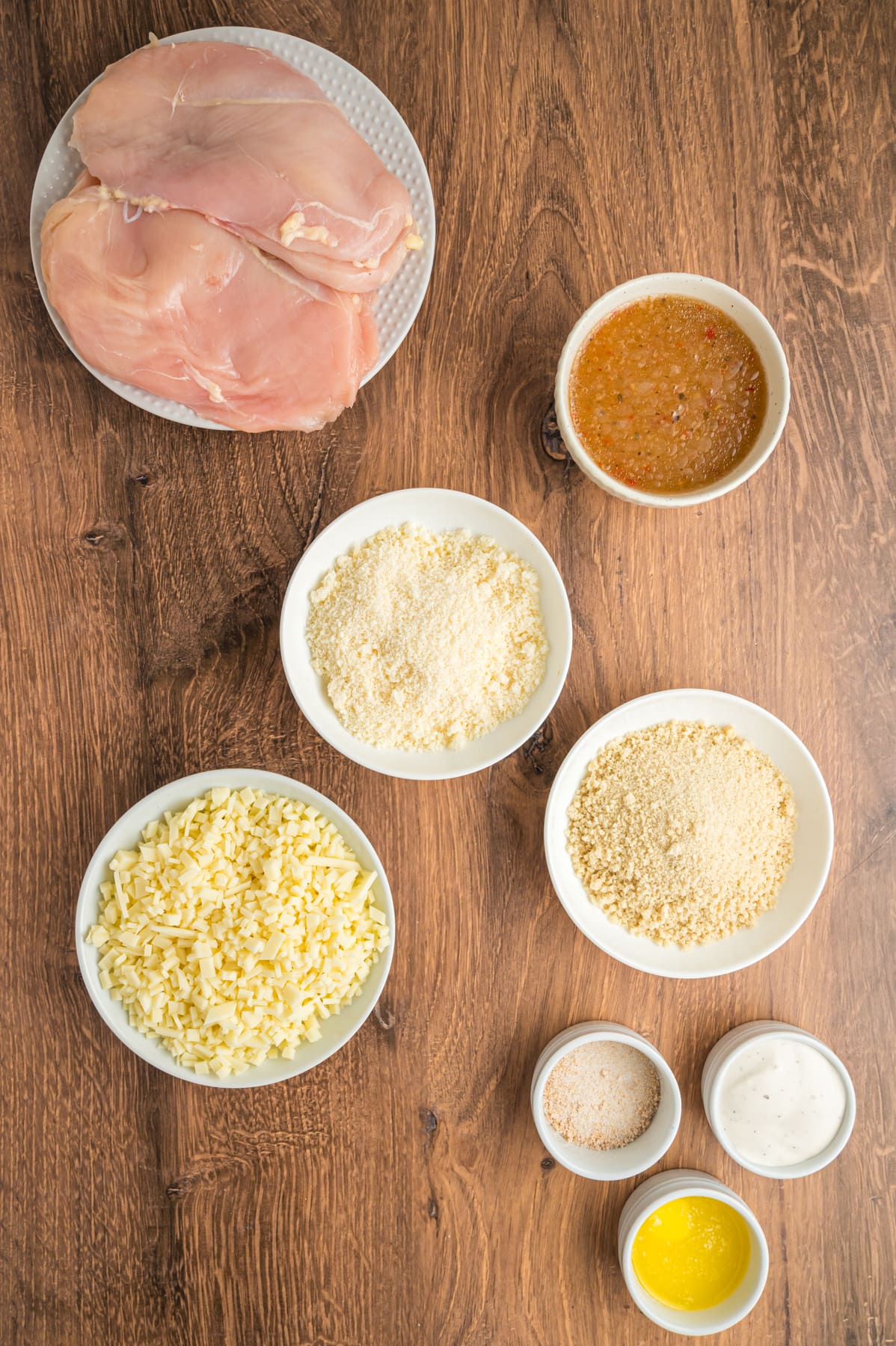 Overhead view of parmesan crusted chicken ingredients