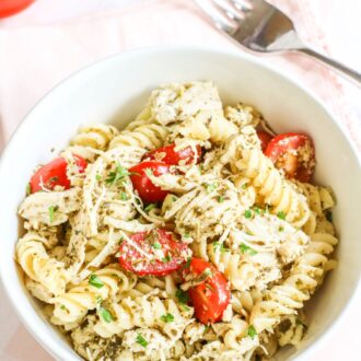 Pesto pasta with chicken in a bowl