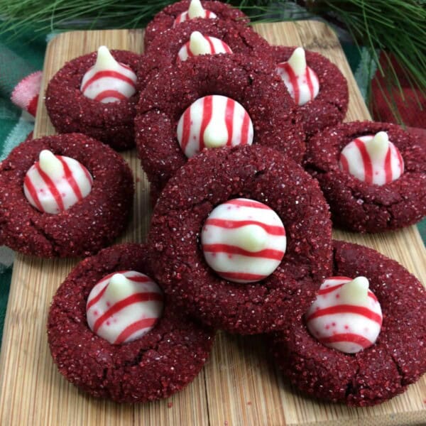 red velvet kiss cookies on a wood board