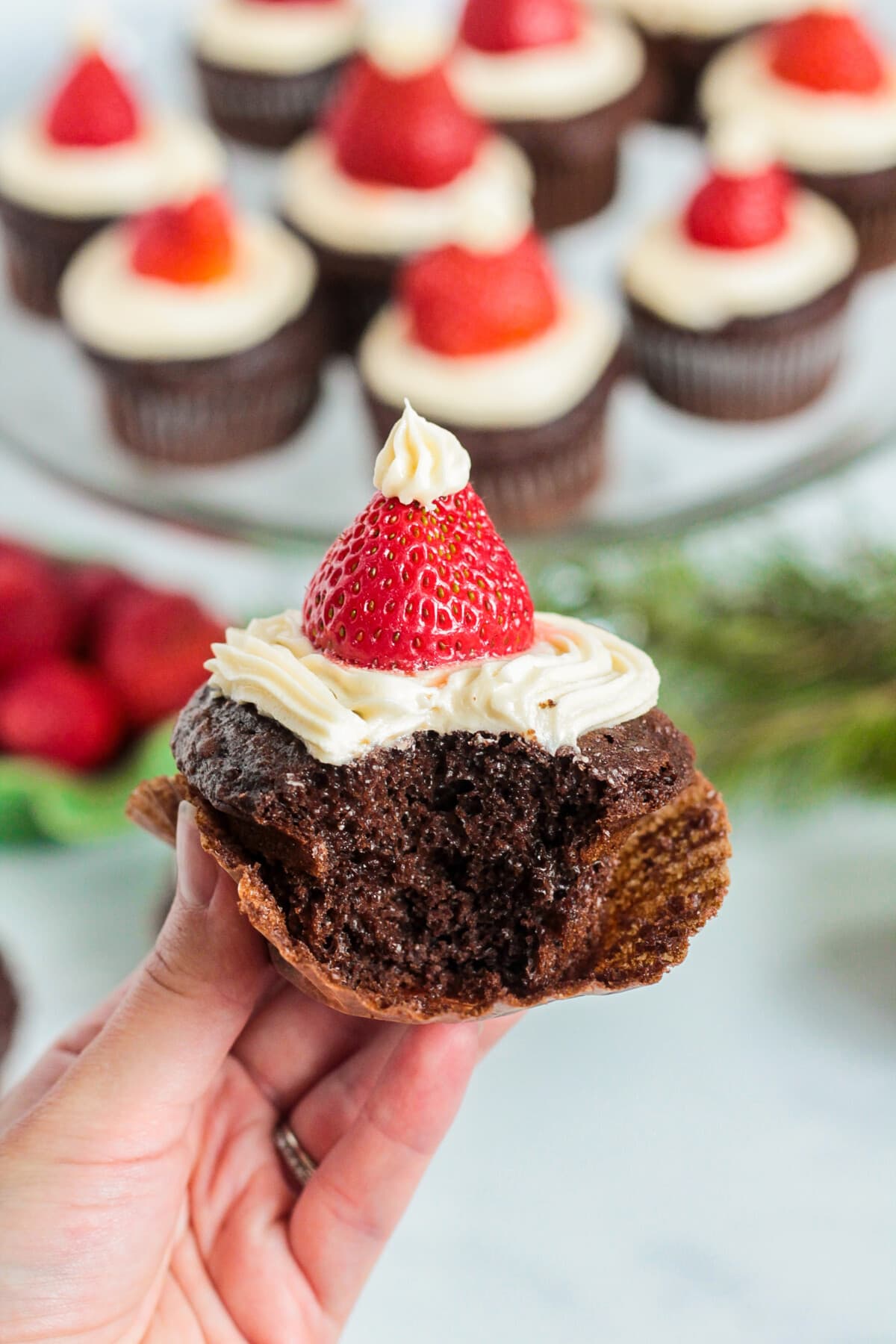bite out of the Santa hat cupcake