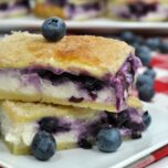sopapilla blueberry cheesecake on a plate