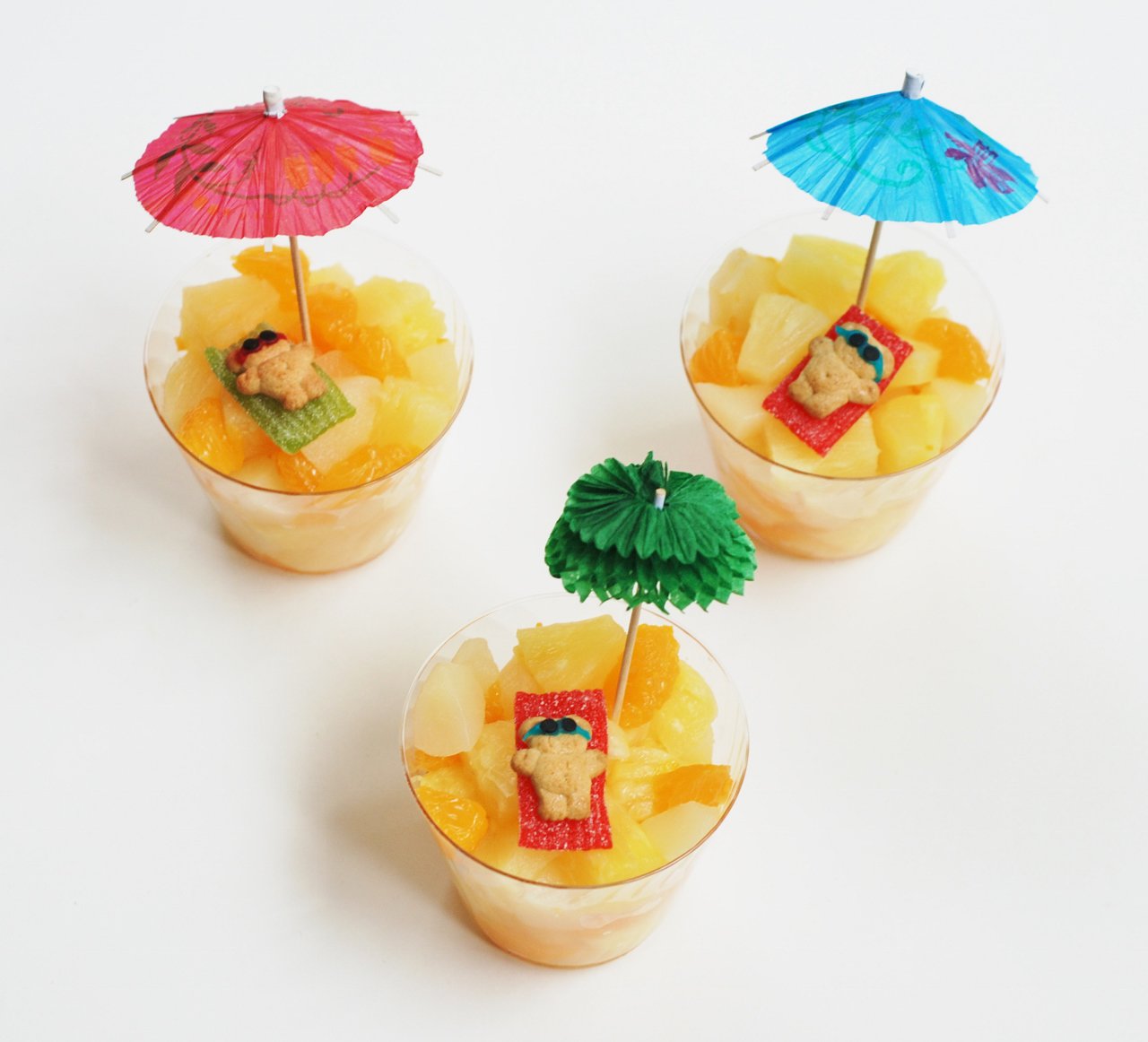 Teddy grahams in fruit cups with umbrellas