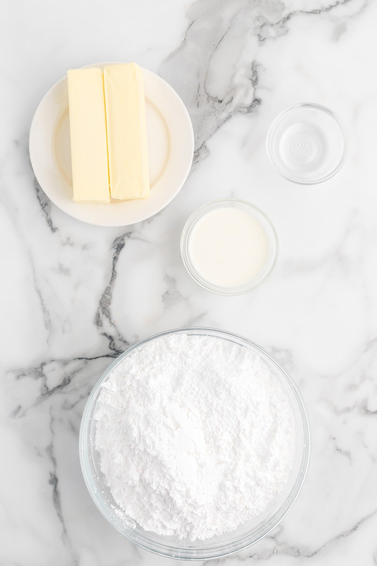 Overhead view of vanilla buttercream frosting ingredients