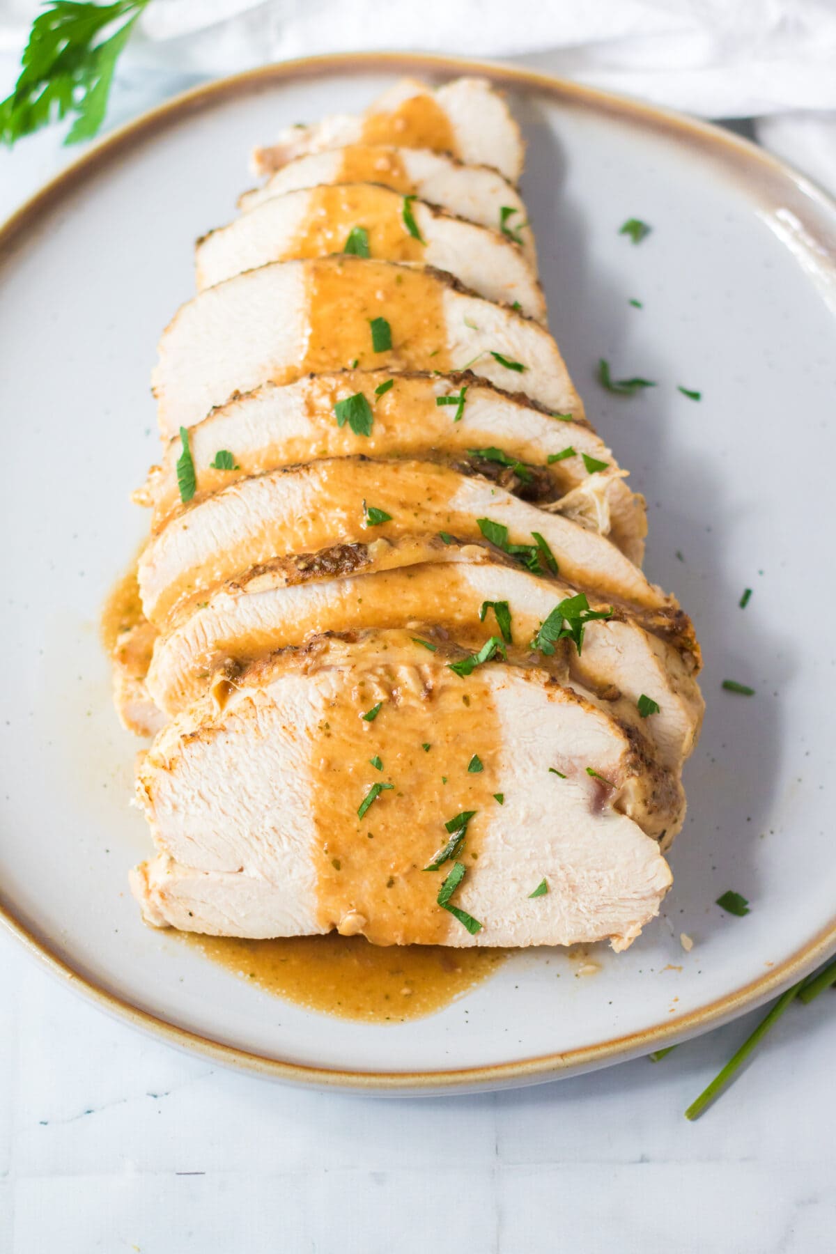 Slow Cooker Turkey Breast slices on a plate